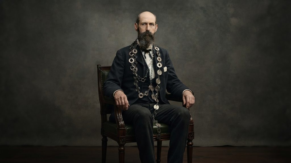 Man_sitting_in_chair_202607240028-1