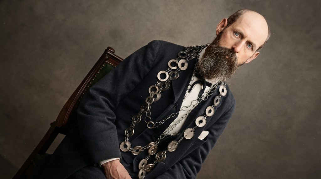 Man_with_silver_chain_202607240028