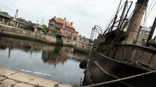 Ship_masts_and_dock_buildings_202607240114