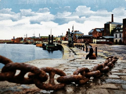 Rusted_chain_on_wet_cobblestones_202608161023