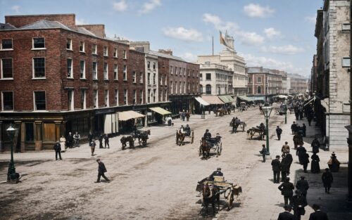 Historic photograph of George Street, Limerick, in 1900, showing street buildings and urban activity.